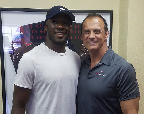 Dr. Doug Arvanitis with NFL receiver Nelson Agholor