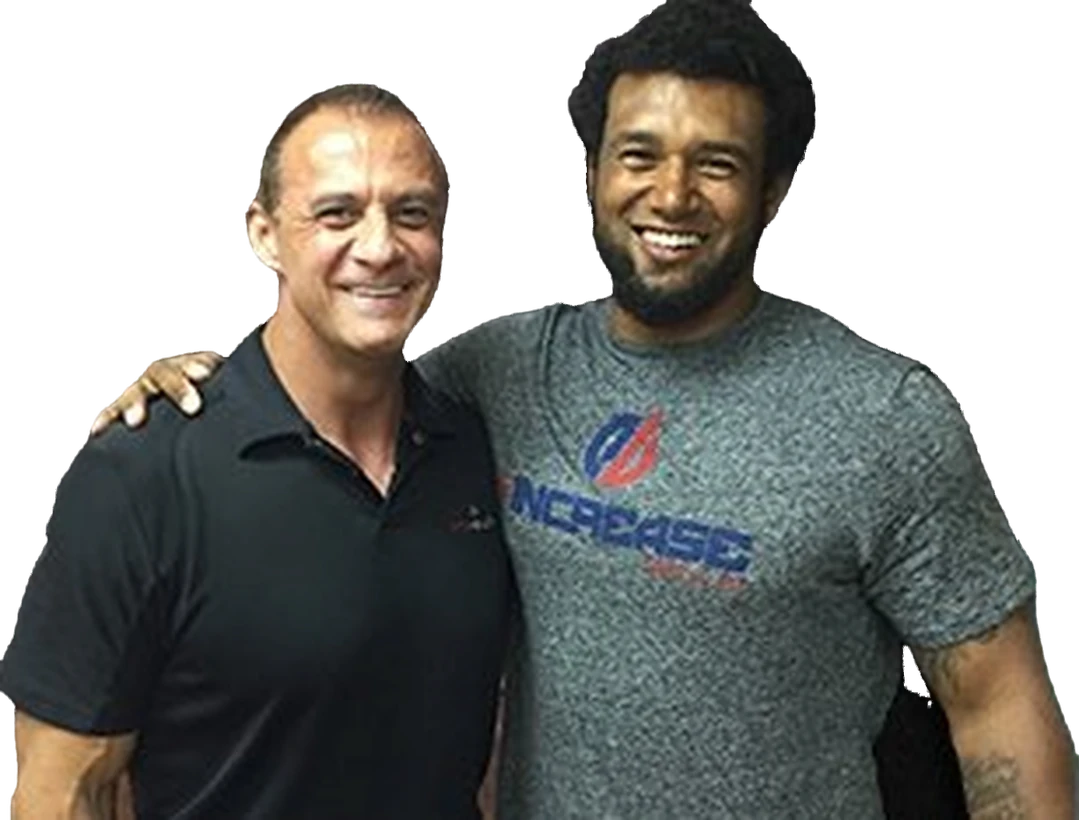 Dr. Doug Arvanitis with a professional athlete at Pro Health